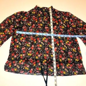 Divided Woman’s Floral Blouse